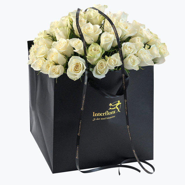 Bilde av 
				60 hvite roser i gavepose
			